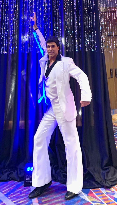 Phil Travolta, the iconic Saturday Night Fever Point Pose