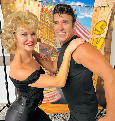 Phil Travolta and Sandy from the Grease